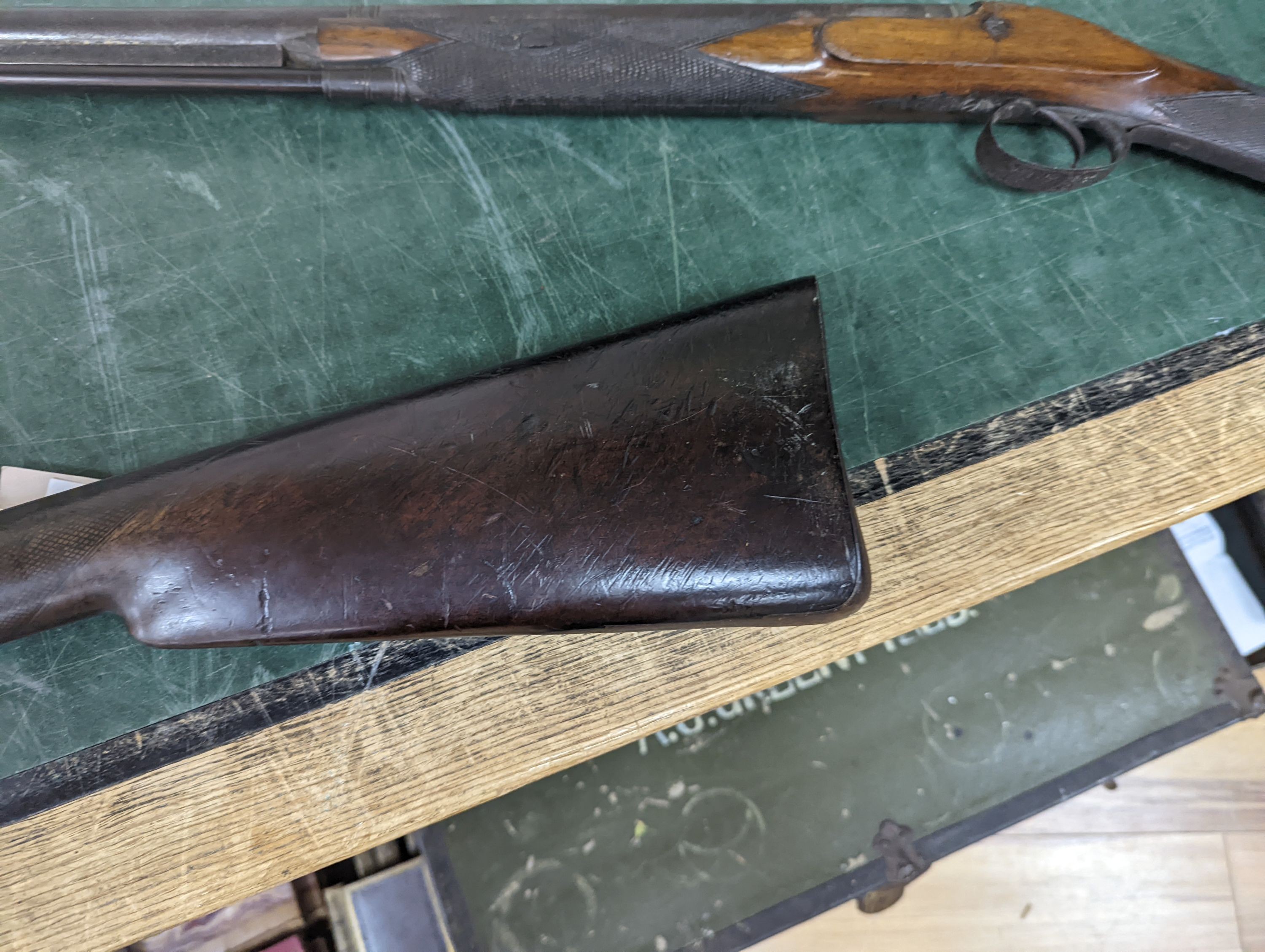 Two 19th century percussion muskets, 103cm. max., one double-barrelled